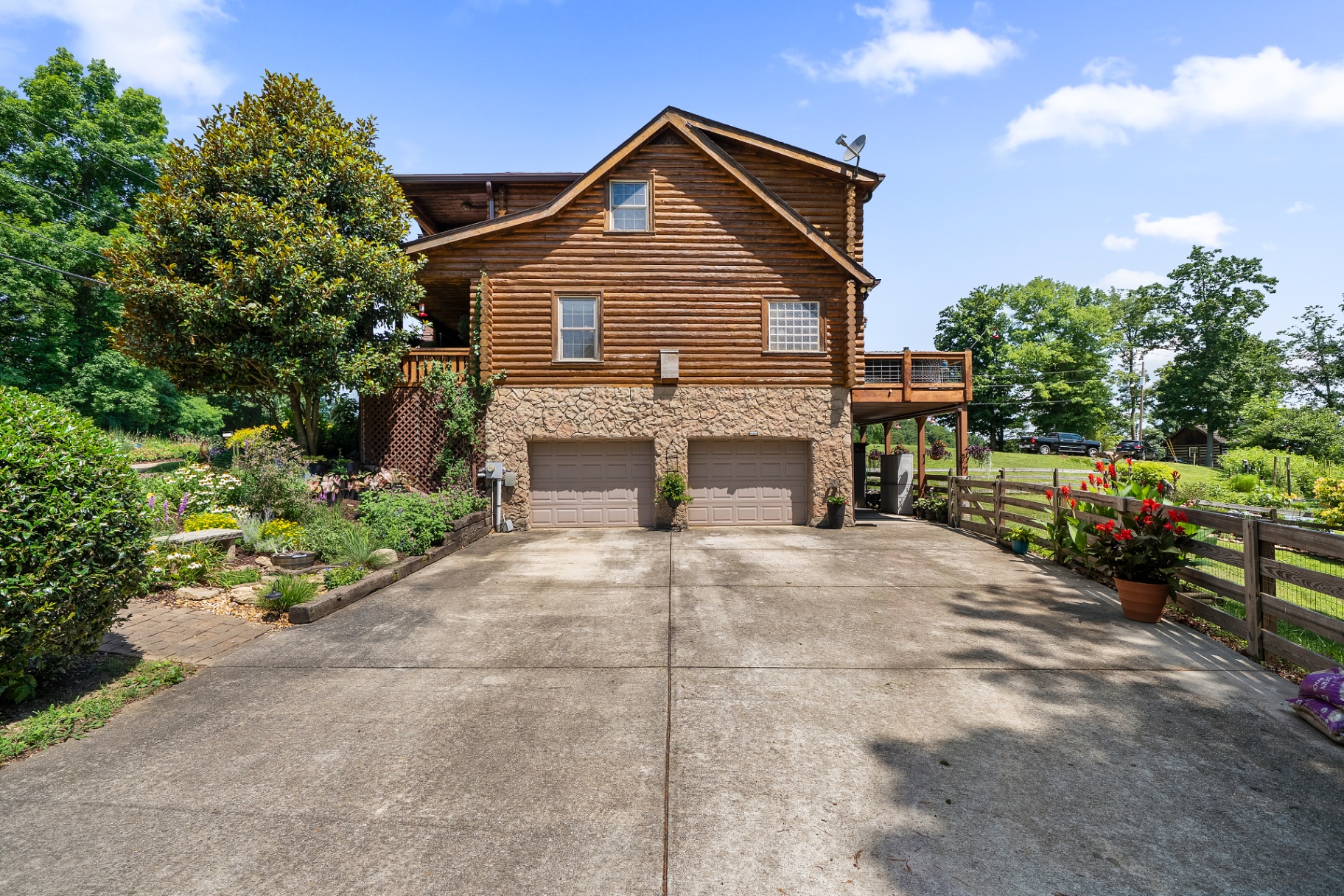 Wooded grounds surrounding the log home